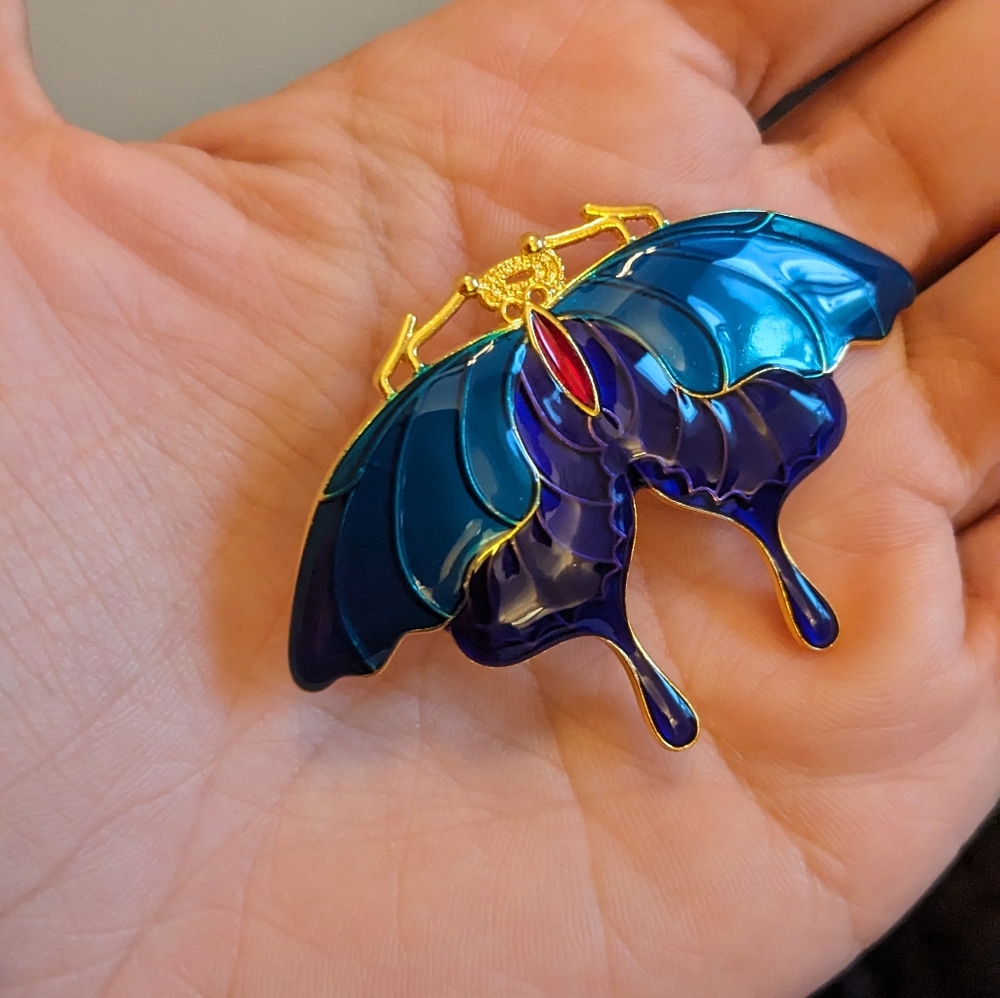 Blue and gold moth hair clip.